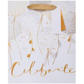 UK Greetings balloons design medium gift bag with colorful balloon illustrations, perfect for gifting occasions.