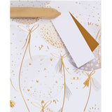 UK Greetings medium gift bag featuring colorful balloons design, ideal for gift packaging and special occasions.