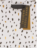 UK Greetings contemporary pattern gift bag with colorful floral and geometric designs, perfect for special occasions.