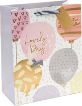 UK Greetings large birthday gift bag with gold foil balloon design, perfect for celebrating special occasions