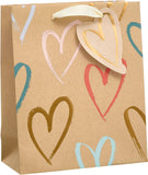 UK Greetings Kraft Hearts Design medium gift bag with pink heart pattern, perfect for gifting occasions.