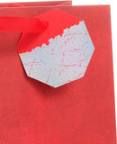 Large red UK Greetings gift bag for him or her, ideal for Christmas, birthdays, thank you, or celebration occasions.