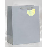 Large UK Greetings gift bag for him, her, or friend with silver design, perfect for stylish gift packaging.