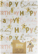 UK Greetings Boofle birthday gift wrap with matching tag featuring colorful Boofle character design.