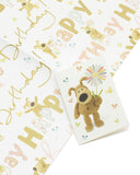 UK Greetings Boofle birthday gift wrap with matching tag, featuring cheerful design and colorful birthday-themed illustrations.