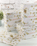UK Greetings Boofle Happy Birthday gift wrap with matching tag featuring colorful birthday-themed design.