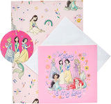 Disney Princess gift wrap with matching gift tag and card by UK Greetings, featuring colorful princess illustrations on paper.