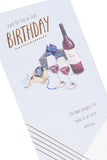 UK Greetings birthday greeting card featuring a watch and wine design with colorful illustrations and festive elements.