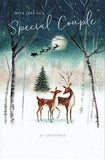 Special Couple 'Happy Christmas' greeting card by UK Greetings featuring a reindeer in snow, perfect for celebrating the holiday together.
