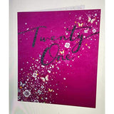 UK Greetings 21st birthday card featuring pink flowers and butterflies, with colorful floral design and celebratory motifs.