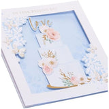 UK Greetings wedding greeting card with 3D effect cake design, featuring elegant floral details and a romantic theme.