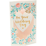 UK Greetings 3D pop-up floral wedding greeting card featuring intricate floral designs and elegant wedding-themed artwork.