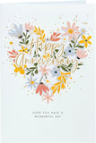 UK Greetings anniversary greeting card for him, her, or friends featuring a floral heart design. Perfect for special occasions.