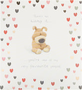 UK Greetings Boofle birthday greeting card featuring colorful cartoon dog design, perfect for celebrating special occasions.
