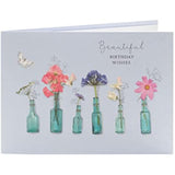 UK Greetings beautiful birthday wishes greeting card featuring colorful floral design and heartfelt message inside.