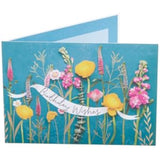 UK Greetings floral design friend birthday card featuring colorful, beautiful flower illustrations on the front.
