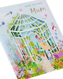UK Greetings beautiful green greenhouse design birthday card for mum, featuring vibrant floral illustrations and heartfelt message.
