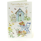 UK Greetings birthday card featuring colorful floral design, perfect for celebrating birthdays with a cheerful greeting.