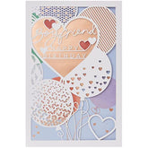 UK Greetings birthday card for boyfriend with laser-cut hearts and balloons, includes envelope, featuring a lovely design.