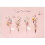UK Greetings birthday card for her featuring dried flower design, includes envelope, perfect for female friends.