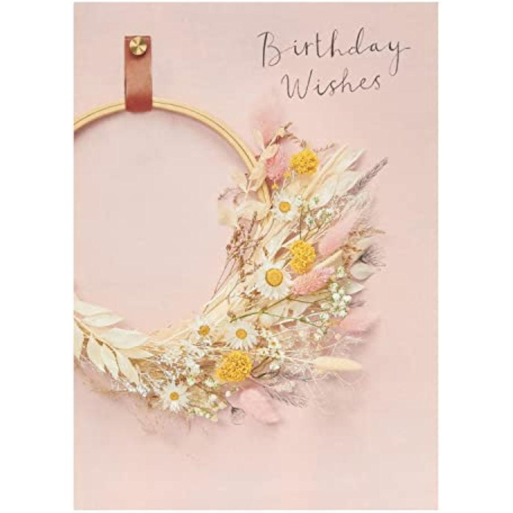 UK Greetings birthday card for her featuring a floral hoop design, includes an envelope, ideal for female friends.