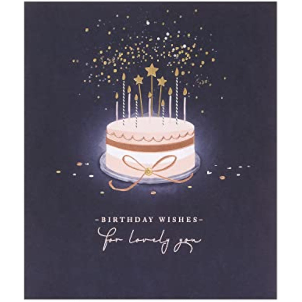 UK Greetings birthday card for her featuring a starry cake design, includes an envelope, perfect for female friends.