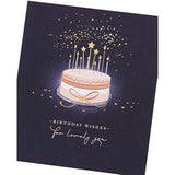 UK Greetings birthday card for her featuring a starry cake design, with a matching envelope, ideal for female friends.