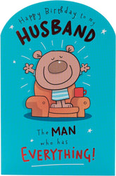 UK Greetings birthday card for husband featuring a humorous design, perfect for celebrating his special day.