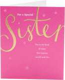 UK Greetings birthday card for sister featuring a pink and gold design, showcasing a festive greeting card with floral accents.