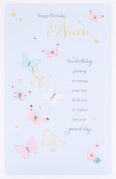 UK Greetings butterflies design niece birthday card with colorful butterfly illustrations and cheerful message inside.