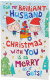 UK Greetings cartoon couple and festive scene Christmas card, featuring colorful holiday-themed illustrations on greeting card.