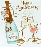 UK Greetings wedding anniversary greeting card with champagne gold foil design for couples celebrating their special day.