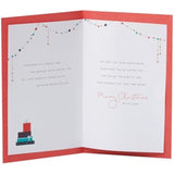 UK Greetings Christmas card for Dad featuring a decorated fireplace design, colorful festive scene, measuring 149x229 mm.