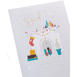 UK Greetings Christmas card for dad featuring a decorated fireplace design, with festive holiday imagery, 149 mm by 229 mm size.