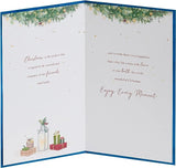UK Greetings Christmas card for sister and brother-in-law featuring a blue door design, perfect for holiday greetings.