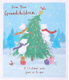 UK Greetings Christmas greeting card featuring cute polar bears and a festive tree design, perfect for grandchildren.