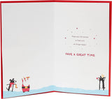 UK Greetings Christmassy Characters tree-themed Christmas card featuring festive characters and holiday design.