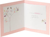 UK Greetings baby girl congratulations greeting card featuring a cheerful design for celebrating a new arrival.