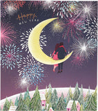 UK Greetings Christmas card featuring a couple sitting on a half moon, celebrating New Year and Christmas together.