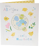 UK Greetings cute Easter card featuring colorful chicks and festive design, measuring 159 x 184mm, ideal for celebrating Easter.