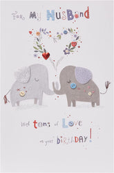 UK Greetings cute elephant husband birthday card with "Tons of Love" message, featuring colorful elephant illustration and festive design