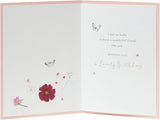 UK Greetings birthday greeting card featuring a cute photographic floral design with colorful flowers on the front.