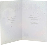 UK Greetings Christmas card featuring a beautiful winter scenery design for daughter and son-in-law, perfect for holiday greetings.