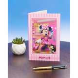 UK Greetings Disney Minnie Mouse 3D keepsake girl birthday card featuring colorful Minnie Mouse illustration and decorative design.