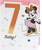 UK Greetings Disney Minnie Mouse birthday greeting card for age 7, featuring colorful Minnie Mouse design on the front.
