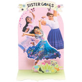 Disney Encanto pop-up birthday card featuring Mirabel, Isabela, and Luisa from UK Greetings with vibrant, colorful characters.