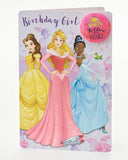 UK Greetings Disney Princess birthday card featuring Belle, Aurora, and Tiana with colorful fairy-tale illustrations.