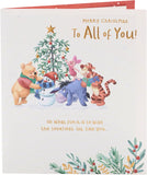 Disney Winnie the Pooh Christmas Card by UK Greetings featuring Pooh and friends in a festive holiday design.