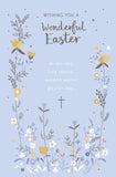 UK Greetings Easter Card featuring a silver cross and flowers, symbolizing the holy season, with colorful floral design.