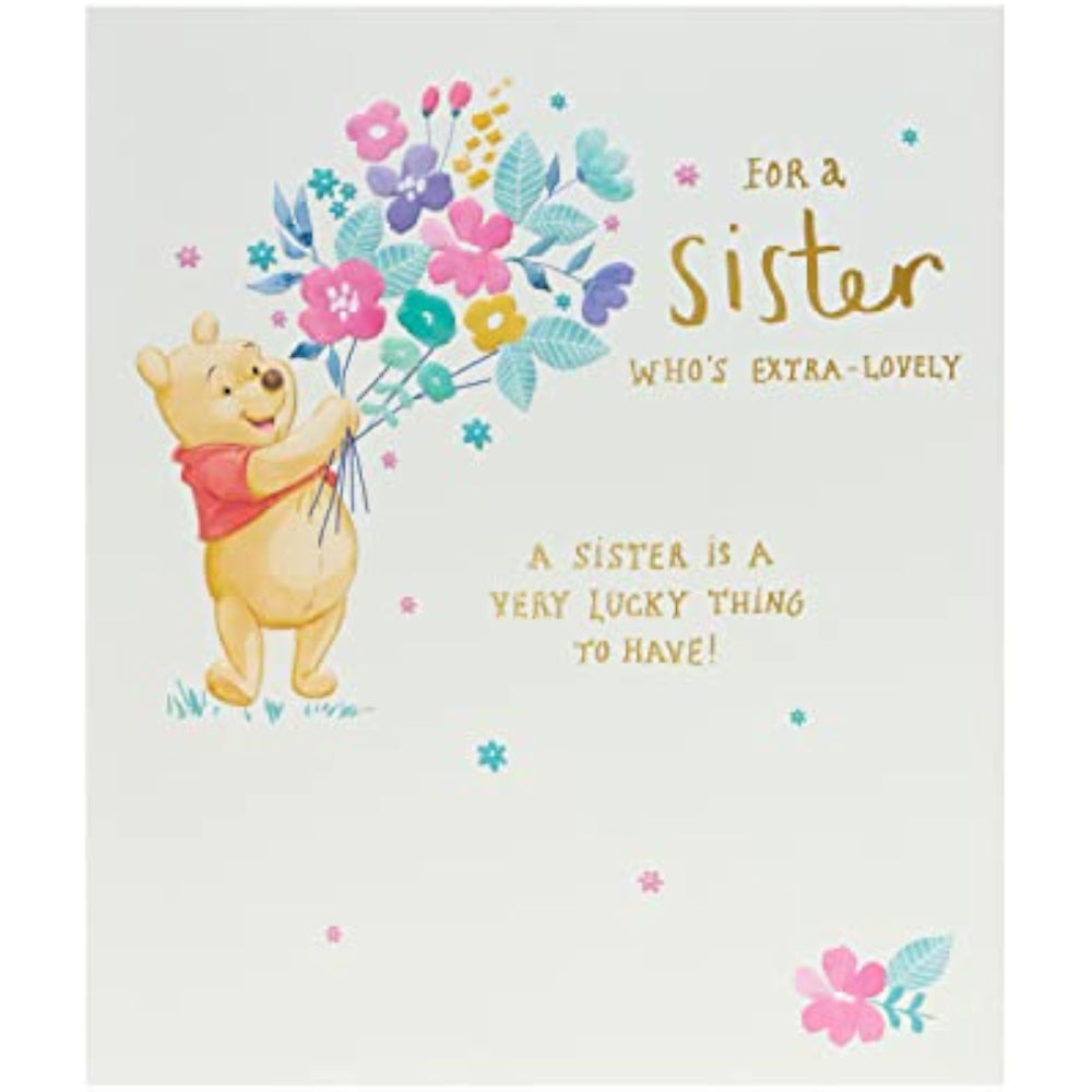 UK Greetings Winnie the Pooh birthday greeting card featuring flowers and a heartfelt message for sisters.
